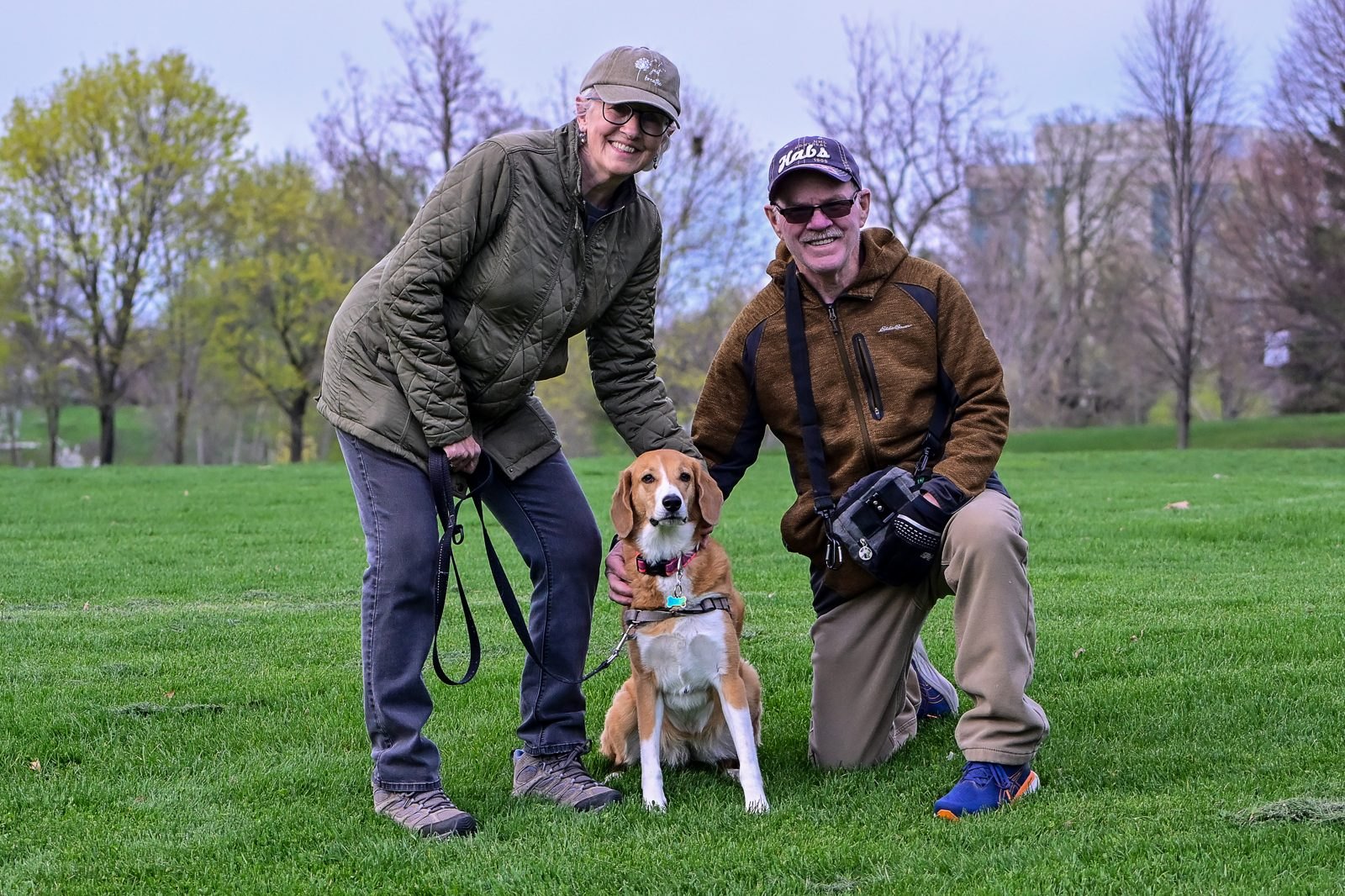 Luna with her owners at a BetterDog Pack Walk